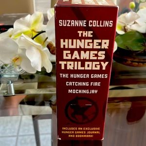 Hunger Games trilogy with notebook(empty)